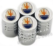 Колпачки на ниппель Мазерати (бел.фон, цилиндр) комплект 4шт CAP.Maserati.Rnd.wh